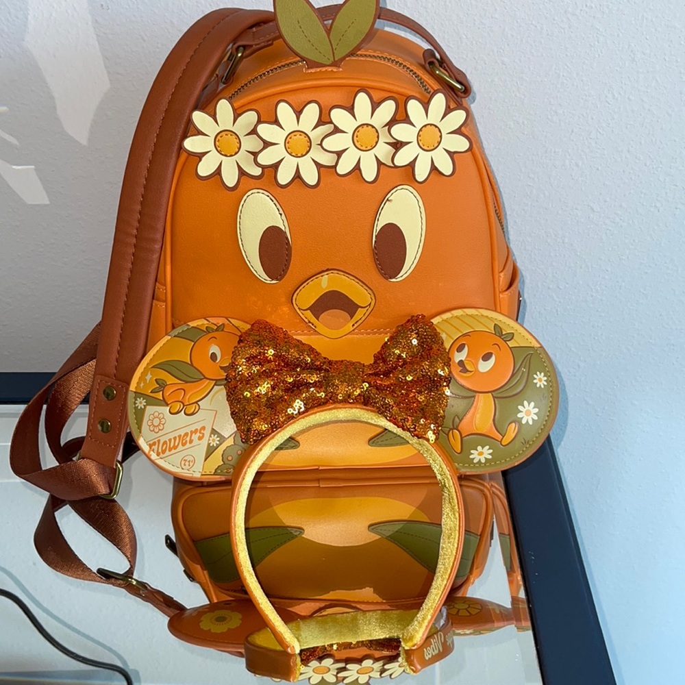 Loungefly orange bird  backpack and Mickey ears